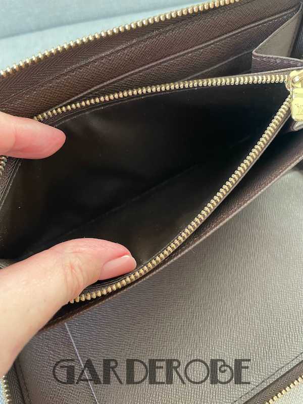 Grote Louis Vuitton zippy wallet in Damier Ebene